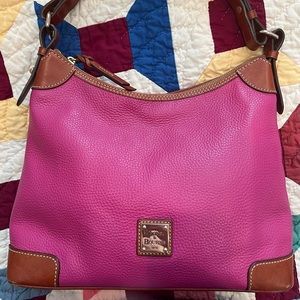 Fun and bright Dooney. Bought directly from dooney and used only a short time.